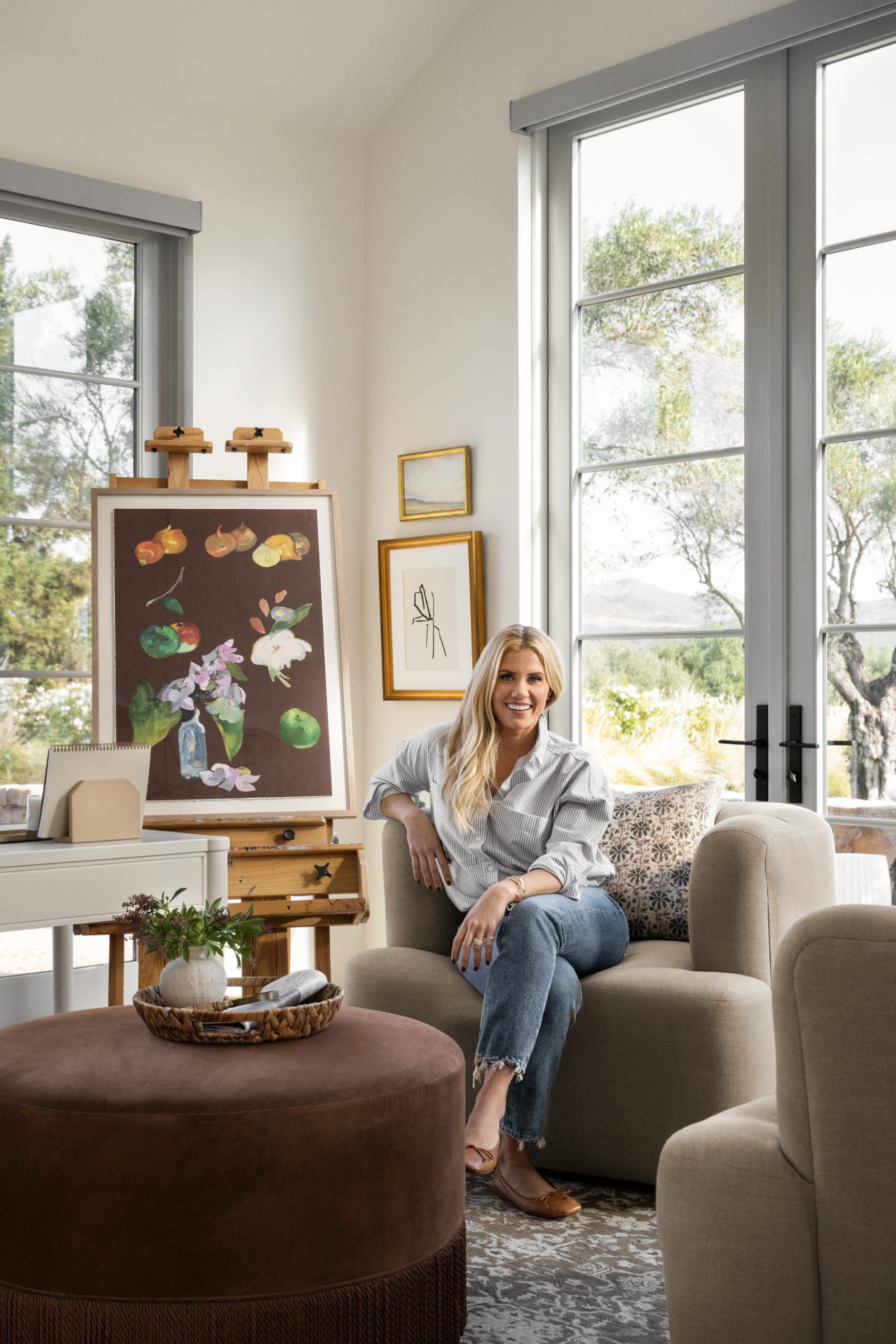 Shea sitting on new mcgee & co chair